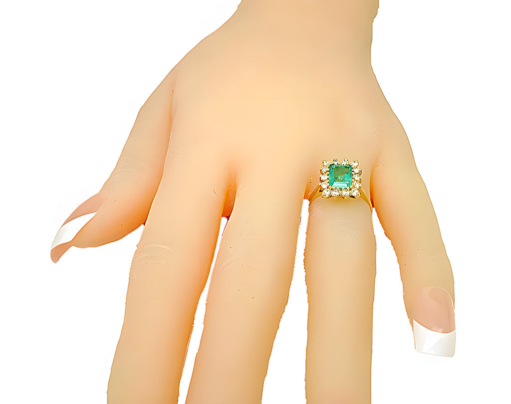 Colombian Emerald cut Emerald with diamond around ring - In House Treasure