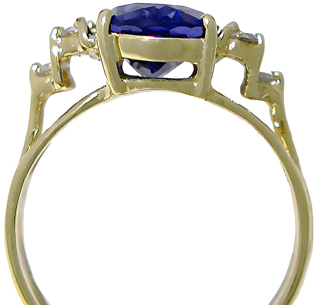 Elongated Oval Tanzanite and diamond ring - In House Treasure