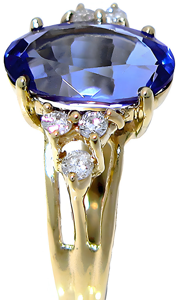 Elongated Oval Tanzanite and diamond ring - In House Treasure