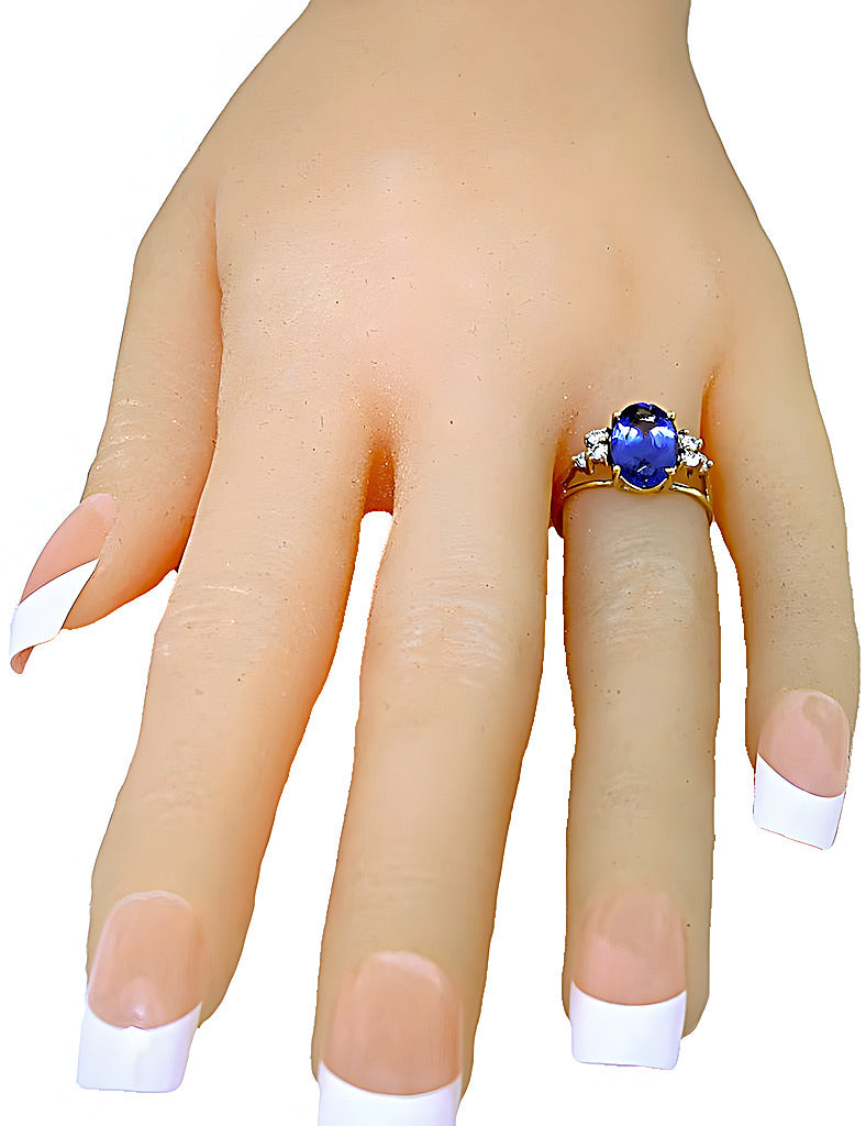 Elongated Oval Tanzanite and diamond ring - In House Treasure