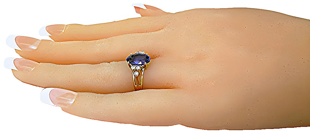 Elongated Oval Tanzanite and diamond ring - In House Treasure