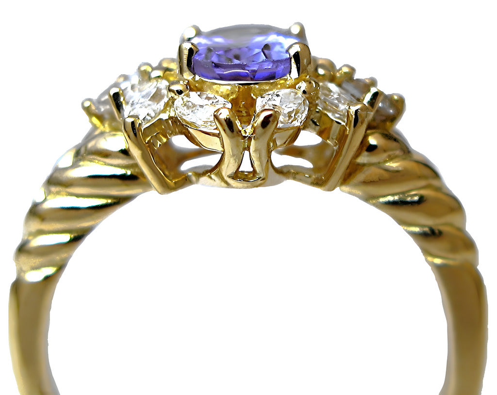 18k yellow gold Oval Tanzanite with marquise and round diamonds ring