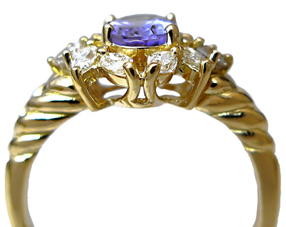 18k yellow gold Oval Tanzanite with marquise and round diamonds ring