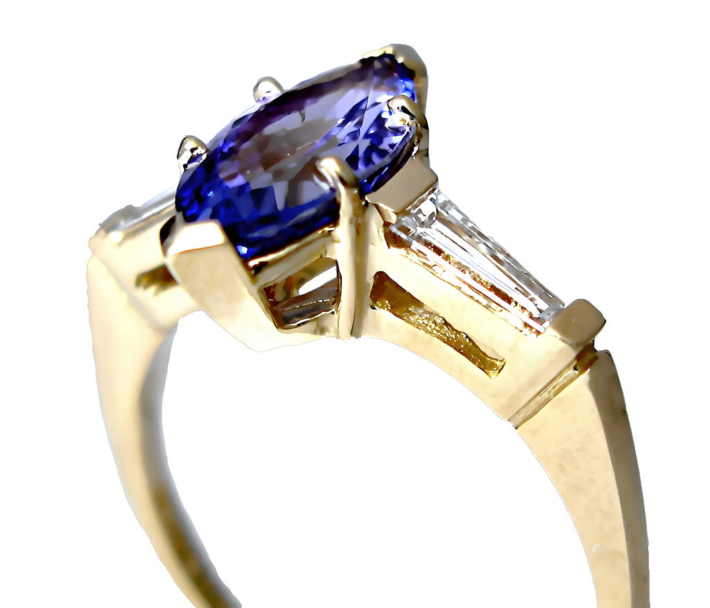 18k yellow gold Marquise Tanzanite and tapered baguette diamond solitaire ring, front view