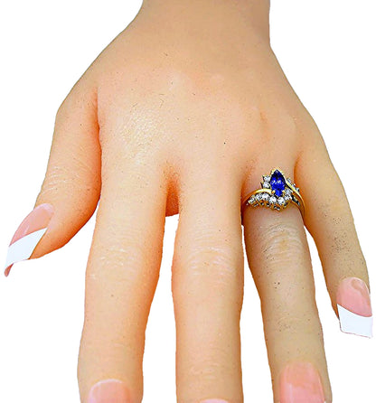 18k yellow gold Marquise Tanzanite and diamond ring, hand front view