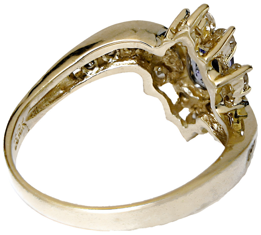 18k yellow gold oval Tanzanite and diamond ring