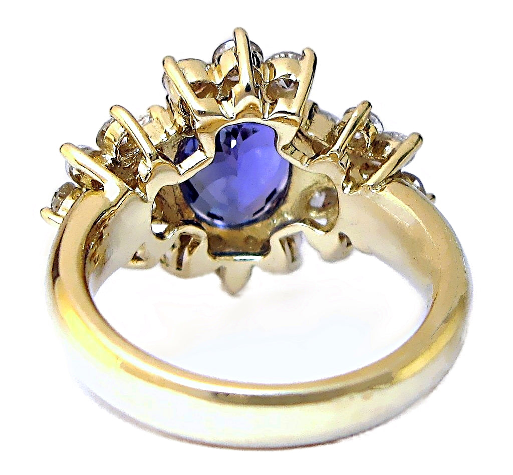18k yellow gold oval Tanzanite with round-marquise diamonds ring
