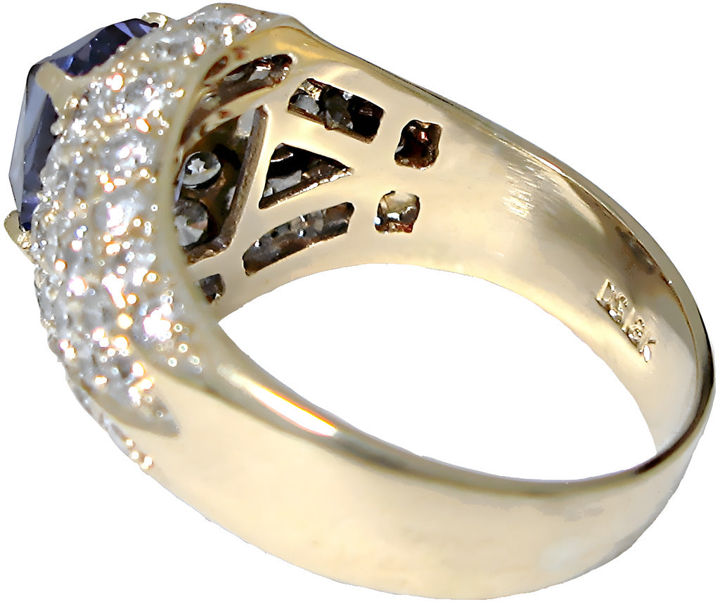 8k yellow gold Emerald/Cushion Cut Tanzanite ring with pave diamonds, laying down angle view