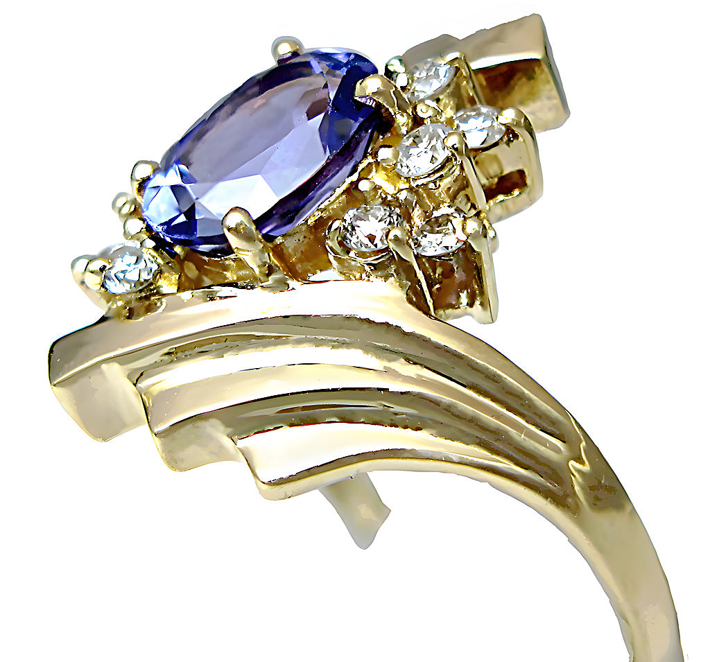 Oval Tanzanite and round diamond ring - In House Treasure