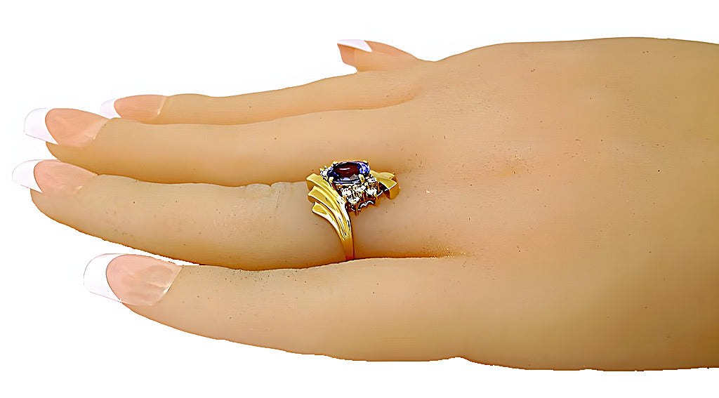 Oval Tanzanite and round diamond ring - In House Treasure