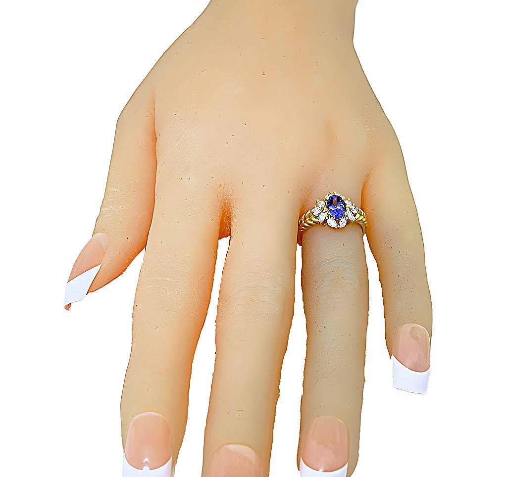 Oval Tanzanite with marquise and round diamonds ring - In House Treasure