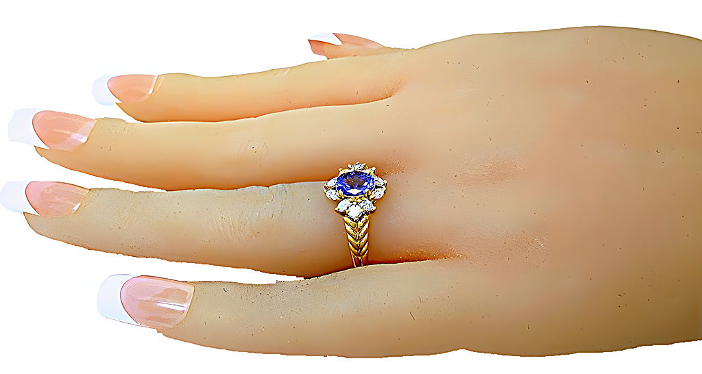 Oval Tanzanite with marquise and round diamonds ring - In House Treasure