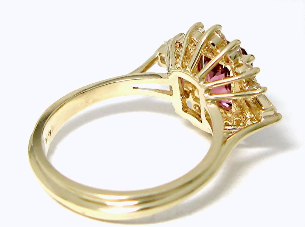 14k-y gold Emerald cut Pink Tourmaline ring with tapered baguettes and round diamonds - In House Treasure