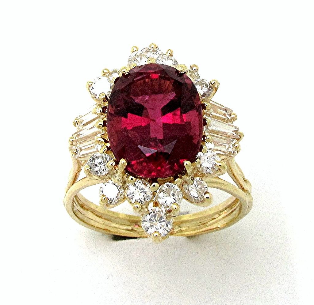 14k yellow gold Oval dark pink/red Tourmaline ring with Tapered baguette and round diamonds - In House Treasure